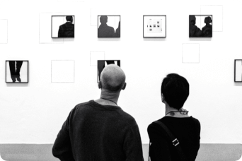 couple looking at paintings