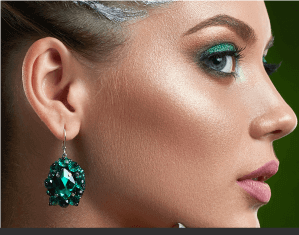Woman Modeling Green Earring
