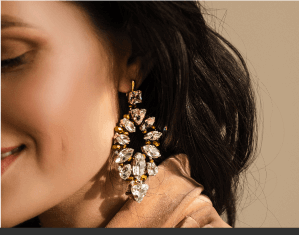 Woman Modeling Golden Earings