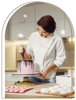 Woman Decorating A Cake
