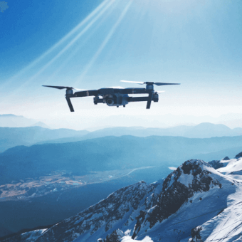 Drone Flying Near Mountain 